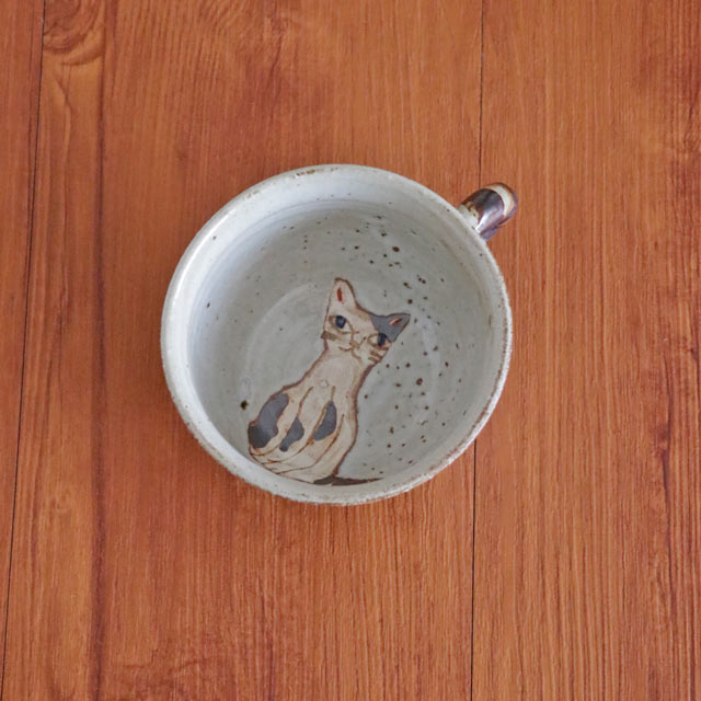 内底の猫の顔